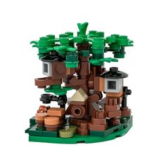 a lego tree with lots of green leaves