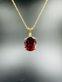 Oval Cut Red Garnet Diamond , 14k Yellow Gold Plated , Garnet pendant necklace ,Minimalist Necklace, Women's Necklace, Christmas Gift Material: High Quality Solid 925 Sterling Silver * Finish: Sterling Silver ∙ 14K Gold * I N F O R M A T I O N * Every item is tastefully wrapped and presented in lovely jewellery boxes. Reusable and biodegradable, our jewellery boxes * Are you interested in your own design or looking for advice? Do not hesitate to contact us! We take pride in our quick response times and are ready to help you. SHIPPING TIME * 3 TO 5 Business Days With USPS Priority Mail CHECKOUT OUR STORE FOR NEW EXCLUSIVE DESIGN: https://garnetcreationdesign.etsy.com Thank you immensely for choosing to visit our store, and we sincerely hope that your shopping experience with us surpasses yo Luxury Garnet Necklace For Anniversary, Classic Red 14k Gold Necklace, Red Round Pendant Necklace In Fine Jewelry, Red Round Pendant Necklace Fine Jewelry, Yellow Gold Garnet Necklaces With Oval Shape, Red Garnet Oval Pendant Necklace, Yellow Gold Oval Garnet Necklace, Oval Garnet Necklaces For Anniversary, Oval Garnet Necklace For Anniversary