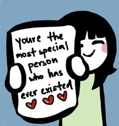 a woman holding a sign that says you're the most special person who has ever visited