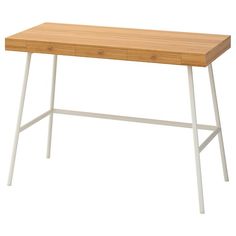 a wooden desk with two white legs