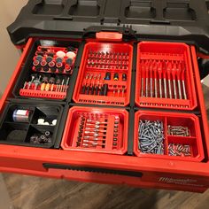 a red tool box filled with lots of tools