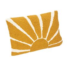 a yellow and white pillow with stripes on it's sides, in the shape of a sunburst