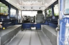 the interior of an empty blue van