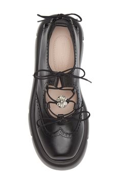 The label's signature romantic style shines on this brogued leather derby set on a chunky lugged platform and secured with ghillie-inspired laces detailed with a crystal brooch. Lace-up style Leather upper and lining/synthetic sole Made in Portugal Designer Shoes Asian & Pacific Islander Owned/Founded Ghillie Brogues, Pacific Islander, Platform Loafers, Crystal Brooch, Derby Shoes, Romantic Style, Black Pearl, Womens Flats, Leather Sneakers