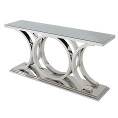 a chrome and glass console table with curved legs on an acrylic base, in the style of art deco