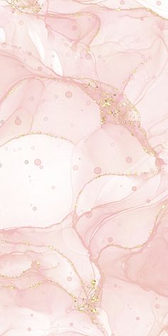 an abstract pink and gold background with lots of bubbles