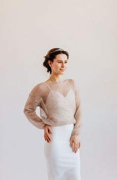 Mohair Silk Sweater. Bridal Sweater. Mohair silk sweater pillover is part of the women's wardrobe which complements and preserves the femininity and uniqueness of your festive or wedding look. This is a truly versatile sweater model for any season. The bottom hem of the sweater is made with a special elastic band for your comfort and this creates a magical decorative effect.  Sweater made with mohair silk blend yarn. In the photo color - 20 - beige. Model height 175 cm / 68.90 " and is wearing s Beige Mohair Long Sleeve Sweater, Beige Mohair Sweater, Elegant Mohair Crew Neck Sweater, Winter Wedding Mohair Sweater, Fitted Mohair Sweater For Layering, Chic Mohair Long Sleeve Sweater, Chic Long Sleeve Mohair Sweater, Elegant Mohair Sweater For Fall, Bride Sweater