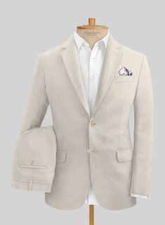 Discover the authentic essence of grandeur with the addition of our Italian Prato Beige Linen Suit. However, cut from a pure linen fabric that brings durable, soft and highly breathable features, it makes a brilliant choice for summer wear. At the same time, lean into the transitional luxury that elevates the warm weather looks by including an efficiently tailored solid beige suit that keeps you dry and cool while maintaining the classic stance which stands apart while appearing on summer outings or heading for the traveling destination. 
 
 Look Includes   Italian Prato Beige Linen Fabric  Two Button Jacket Style  Notch Lapel  Faux Horn Beige Buttons  Single Vent  Three Cuff Buttons  Two Welted Back Pockets on Trousers   You can change the look during customization if required. 
 
 Lining