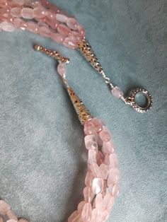 "Wow!! Massive and gorgeous faceted rose quartz polished assorted shape stones. The flat rose quartz teardrop measure about 24mm long and 20 4mm wide, varying sizes. The smaller faceted polished rose quartz vary at 8mm. This beautiful necklace measures 22\" from inside to 25\" to the outside strand. A great look for any occasion." Rose Quartz Necklace, Beautiful Necklace, Quartz Necklace, Austin Tx, Tassel Necklace, Beautiful Necklaces, Rose Quartz, Austin, Jewelry Accessories