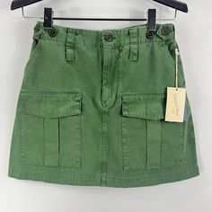 New With Tags. Retail Price $25. Women's Mini Utility Cotton Skirt With Side And Front Pockets Size 2 In Green. 14.5" Waist Laying Flat, 16" Overall Length. Casual Green Cotton Cargo Skirt, Green High Waist Casual Skort, Casual High Waist Green Skort, Casual Green Skirt With Pockets, Green Cotton Skort With Pockets, Green Cotton Mini Skirt For Work, Green Cargo Skirt With Pockets, Green Utility Mini Skirt, Green Utility Skirt For Summer