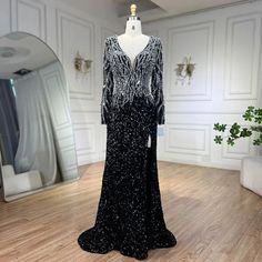 Elegant 2024 Dubai Black Mermaid Evening Dresses: Luxury V-Neck Black V-neck Evening Dress, Black Long Sleeve Gown For Gala, Black V-neck Gown With Sweep Train, Black Long Sleeve Formal Evening Dress, Formal Black Gown With Fitted Bodice, Black Long Sleeve Gown For Prom Season, Black Long Sleeve Gown For Prom, Glamorous Black V-neck Evening Dress, Black Evening Dress With Fitted Bodice For Formal Events