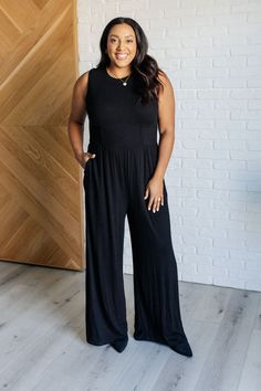 The Hilary Wide Leg Jumpsuit is an absolute staple that can transition perfectly into any season! The bodice has a round neckline and flattering waistline with tons of stretch. A functional hidden zipper makes it a breeze to slip on and off. The straps have plenty of coverage for your bra and the ribbed fabric drapes beautifully on the body! True to Size Pockets Great Stretch 93% Viscose/7% Elastane Model Sabrina is wearing a size SModel Krychele is wearing a size XL Suggested Pairings: Just In Draped Fabric, Romper Dress, Wide Leg Jumpsuit, Sweater And Shorts, Dress Romper, Ribbed Fabric, Easy Wear, Long Tops, Hidden Zipper