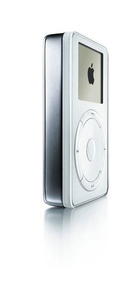 an apple ipod sitting on top of a white surface