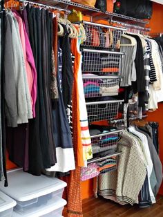 an organized closet with clothes, shoes and other items hanging on the wall next to it