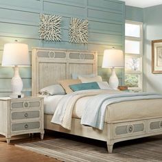 a bedroom scene with focus on the bed and nightstands