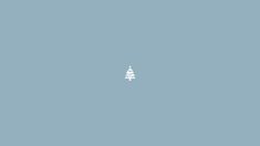 a white christmas tree on a blue background