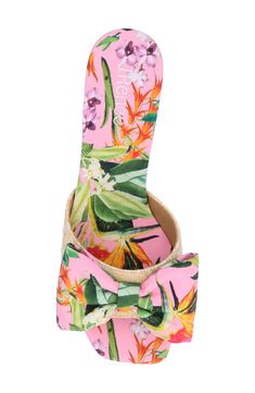 Colorful floral patterns and a woven strap play up the tropical flair of this memory foam-cushioned wedge sandal. 2" heel Memory foam cushioning Textile upper/synthetic lining and sole Imported Pink Synthetic Wedge Sandals For Beach Season, Pink Wedge Sandals For Beach Season, Pink Synthetic Wedge Sandals For Vacation, Pink Synthetic Wedge Sandals For The Beach, Pink Synthetic Wedge Sandals For Beach, Spring Beach Floral Print Wedge Sandals, Pink Open Toe Wedge Sandals For Vacation, Floral Print Wedge Sandals For Vacation, Tropical Synthetic Sandals For Spring