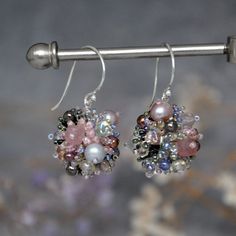 Introducing our stunning hand beaded dangle ball earrings.  These earrings are designed to make a statement with their unique combination of materials and intricate beading.  The smaller size compared to our bestselling ball earrings makes them perfect for everyday wear. Despite the delicate appearance, these earrings are lightweight and comfortable to wear all day long. The earrings feature a blend of moonstone, faceted strawberry quartz, agate, Japanese seed beads, freshwater pearls and other Intricate Beading, Cherry Quartz, Beading Jewelery, Ball Earrings, Earrings Bohemian, Wedding Jewelry Earrings, Strawberry Quartz, Quartz Earrings, Fun Earrings