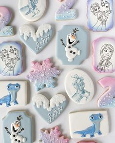 frozen princess cookies are arranged on a table