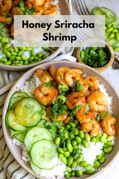 two plates filled with rice and shrimp next to cucumber, peas and broccoli