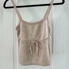 Nwot Fp Cozy Up Cashmere Tank In Color Chinchilla, Size Small Cozy Beige Knit Top For Loungewear, Beige Cozy Tops, Beige Cozy Fit Top, Cozy Beige Tops, Beige Knit Top For Loungewear, Cozy Beige Knitted Tops, Cozy Sleeveless Beige Top, Sweet Tee, Free People Bodysuit