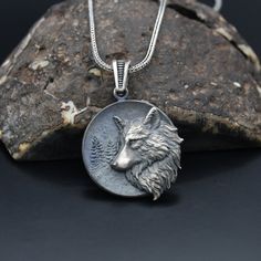 "Wild Wolf Silver Necklace,Wolf Charm With Chain,Animal Lover Necklace,Handmade Necklace,925 Sterling Silver Necklace,Oxidized Unisex Jewelry ✦ Details ✦ * Material: 925 Sterling Silver * Weight of pendant : 15,00  gram *  Chain Weight :     20 Inches = 5.00 Gr     22 Inches = 5.60 Gr     24 Inches = 6.05 Gr     26 Inches = 6.10 Gr     28 Inches = 6,40 Gr * Sides oxidized * Stamp: 925 ✦ Shipping ✦ * Processing time: 1-3 business days. * This item ships from my Turkish workshop in Istanbul. * Add your phone number in address box for a smoother delivery. That makes courier personnel's job easier.  ✦ Packaging ✦ * Comes with a luxury gift box and a jewellery cleaning cloth and courtesy gift. ✦ Returns, Exchanges ✦ * Return option available for 30 days after the delivery. * The product has to Sterling Silver Wolf Design Jewelry Gift, Sterling Silver Wolf Design Necklace As Gift, Round Wolf Design Jewelry Gift, Sterling Silver Necklace With Wolf Design As Gift, Sterling Silver Necklace With Wolf Design For Gift, Sterling Silver Jewelry With Wolf Design For Gift, Wolf Design Round Jewelry Gift, Sterling Silver Wolf Design Jewelry, Silver Wolf Pendant Necklace