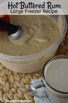 hot buttered rum large freezer recipe in a glass mug next to a spoon