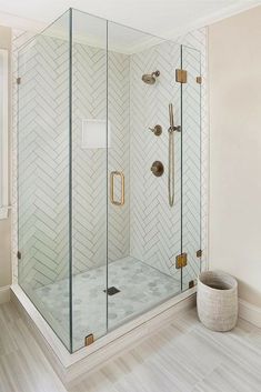 a walk in shower sitting next to a window on top of a hard wood floor