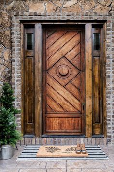 a wooden door sitting on top of a stone building