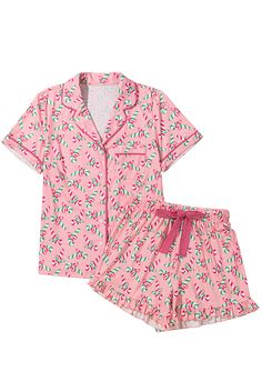 Get into the festive spirit with our Pink Candy Cane Christmas Pajama Set! This cozy and stylish pajama set is perfect for lounging during the holiday season. The long sleeve top, adorned with a playful candy cane print, adds extra warmth and holiday cheer, while the knotted shorts offer a trendy twist to keep you comfortable. Complete with pockets for added convenience, this set is perfect for staying cute and cozy through the festive season. Details: • Festive Candy Cane Print: Celebrate the s Gingerbread Pajamas, Cute Christmas Pjs, Cute Pj Sets, Christmas Slideshow, Christmas Sweatshirt Ideas, Pink Candy Cane, Burr Basket, Christmas Pajama Shorts