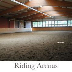 an empty horse barn with no people in it