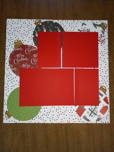 red paper cut into squares on top of a table