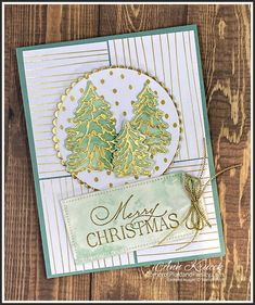 a christmas card made with stampin's merry tree dieing dies and some gold foil