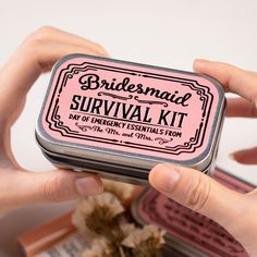 two hands holding a tin of survival kit