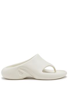 cream white slip-on style branded insole chunky sole round toe White Slippers With Textured Sole And Round Toe, White Textured Sole Slip-on Slides, Cream Slides With Cushioned Footbed, Cream Cushioned Slip-on Slides, White Rubber Sole Flip Flops For Spring, Comfortable White Slides With Rubber Sole, White Open Toe Slippers With Rubber Sole, Comfortable White Sandals With Rubber Sole, Modern White Sandals With Rubber Sole