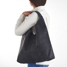 This hobo bag is made of high quality vegan leather in black. It is soft and lightweight but durable. It has a rustic, distressed look. The inner side is unlined for a minimal style and it has a zippered interior pocket. it has a magnetic clasp closure for security. The strap sits on the shoulder comfortably. It has a slouchy silhouette and plenty of room for your daily needs.  Measurements Height: 320mm Width: 450mm Depth: 100mm Strap Length: 240mm // Please add your phone number to the notes section before checkout. // Thanks for your visit. Brown Backpacks, Slouchy Bag, Everyday Handbag, Hobo Shoulder Bag, Hobo Bags, Leather Hobo Bag, Boho Bag, Distressed Leather, Hobo Handbags