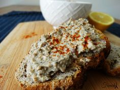 two pieces of bread with spread on them