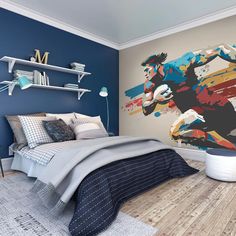 a bedroom with blue walls and a large painting on the wall