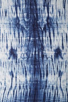 blue and white tie - dyed fabric with lines