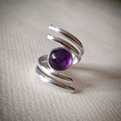 Welcome To My Shop  Natural Amethyst Ring, Handmade Dainty Ring, 925 Sterling Silver Ring, Round Amethyst Ring, Gift for her, February Birthstone, Promise Ring Handmade item Ships from a small business in India Gemstone: Amethyst  Gem color: Purple Band color: Silver Style: Boho & hippie Natural Amethyst Ring, Handmade Dainty Ring, 925 Sterling Silver Ring, Round Amethyst Ring, Gift for her, February Birthstone, Promise Ring Made of 925 sterling silver Gemstone: Amethyst Metal: 925 sterling silver US Ring Size: Choose Size Main Stone Creation: Natural * This Ring Is handmade and made with Love and Care in our workshop * This Ring Is Made To Order * This Ring Is made to order. Our turn around time is about 6 - 10 business days. How to care for sterling silver Jewelry Keep your jewelry away Adjustable Hallmarked Purple Rings, Nickel-free Purple Rings For Jewelry Making, Handmade Adjustable Sterling Silver Amethyst Ring, Adjustable Sterling Silver Amethyst Ring Gift, Adjustable Nickel-free Purple Ring, Adjustable Hallmarked Silver Amethyst Ring, Elegant Purple Nickel-free Rings, Silver Amethyst Cabochon Rings, Adjustable Purple Cabochon Ring