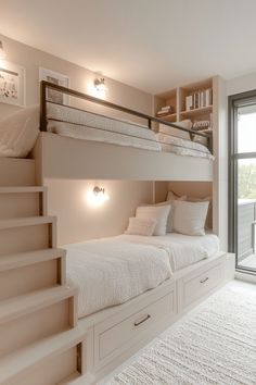 two bunk beds sitting next to each other on top of a white carpeted floor