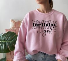 Birthday Girl Design printed on Unisex Gildan® - Heavy Blend™ Crewneck Sweatshirt The Unisex Tees Run big if you want a fitted look order a size down Arguably our most popular crewneck, the Gildan G180 heavy blend fleece crew sweatshirt is the perfect mix of 8 oz 50% cotton and 50% polyester. Made using pill-resistant air jet yarn, double-needle stitching throughout, and set-in sleeves, the Gildan G180 is a casual classic that offers comfort and durability that'll withstand the everyday wear-and Trendy Crew Neck Sweatshirt For Birthday, Birthday Letter Print Relaxed Fit Sweatshirt, Relaxed Fit Letter Print Sweatshirt For Birthday, Birthday Sweatshirt With Graphic Print In Relaxed Fit, Pink Long Sleeve Top For Birthday, Pink Slogan Top For Birthday, Pink Birthday Top With Text Print, Pink Birthday Tops With Text Print, Pink Crew Neck Top For Birthday