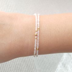 "Minimalist, wearable and delicate rose quartz and 14k gold filled beaded bracelet for everyday wearing. Length: from 5,5\" to 8\" with 2\" 14k gold filled extensor chain. Width: 2 mm 14k gold filled beads and rose quartz beads. Material: 14k gold filled strong lobster clasp. Handmade in Spain. ✩ Please kindly note that these stones are natural so they can vary slightly in color from the one on the pics. They can also contain some inclusions. ✩ Ideal for a gift to gold jewelry lovers. All our pr Minimalist Crystal Bracelet With Faceted Beads For Everyday, Minimalist Everyday Crystal Bracelet With Faceted Beads, Dainty Beaded Bracelets With Faceted Beads, Dainty Rose Gold Beaded Bracelets, Dainty Crystal Bracelet With Gemstone Beads For Everyday, Dainty 14k Gold-filled Bracelets With Gemstone Beads, Dainty Rose Quartz Round Beads Bracelets, Minimalist 14k Gold Filled Beaded Bracelets, Dainty Hand Wrapped Beaded Bracelets For Everyday