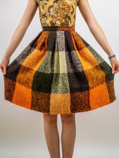 "Adorable early 1960s Bonnie Cashin style mohair skirt with a vibrant plaid pattern, easy to pair with anything to fit into any closet! Fabric content: Mohair Colour: Orange, green, brown, yellow Condition: great Measurements: Waist (around): 25\" Hip (around): 66\" Length: 26\" Models measurements: Shoulder - shoulder: 17\" Bust: 34\" Waist: 27\" Hip: 39\" Height: 5'10\" **all vintage sales are final - no refunds**" Retro Green Skirt For Fall, Vintage Multicolor Skirt For Fall, Mohair Skirt, 60s Fabric, Bonnie Cashin, Fit And Flare Skirt, Vintage 1950s Dresses, Colour Orange, 1950s Dress