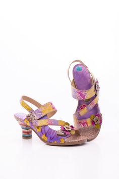 Walk on the wild side with this midnight sol floral leather slingback sandal! Slip into a sassy summer look that's as stylish as it is comfy. It's a no-brainer for any fashionista looking for a chic way to make a statement. Make 'em say "soffia!" 2.16" heel Hook & velcro closure Genuine leather upper Leather footbed Leather lining Leather midsole Rubber sole Reindeer Headband, Walk On The Wild Side, Dress Jewelry, Summer Look, Slingback Sandal, Online Gifts, Walk On, Summer Looks, Purple Color