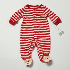 Holiday Sleeper By Carter's. Crafted In Soft Cotton With A Cute Dog, This 1-Piece Gets Them Ready For Bed In This One Piece! Snaps From Ankle To Chin Ribbed Cuffs & Neckline Allover Stripes Print Appliqu And Embroidered Santa Foot Art Imported Machine Washable 75% Cotton 25% Polyester Red Playful Winter Onesie, Playful Red Winter Onesie, Cute White Holiday Sleepwear, Red Onesie For Playtime In Winter, Red Winter Onesie For Playtime, Red Winter Onesie For Sleep, Red Long Sleeve Onesie For Playwear, Red Winter Sleep Onesie, Red Long Sleeve Onesie For Play