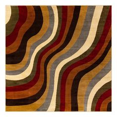 an area rug with wavy stripes on it