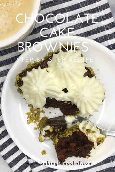 chocolate cake with white frosting on a plate