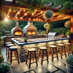 an outdoor kitchen is lit up with lights