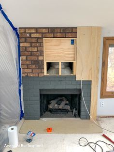 the fireplace is being installed in the living room